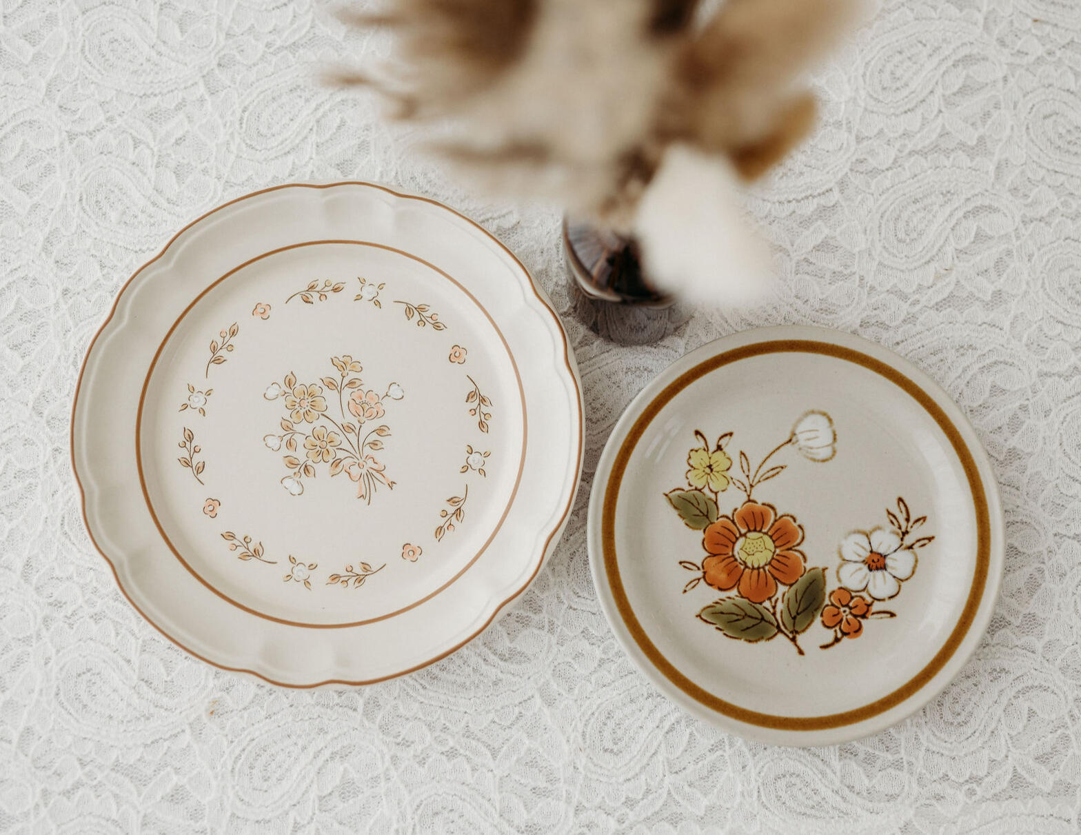 NOTE: only pattern on the left, Cordella, in stock. '70s stoneware dinner plates, 90 available: $225; side plates, 30 available: $60; not pictured: bowls, 100 available: $200